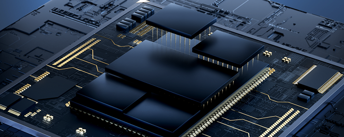 Dark semiconductor chips mounted on a circuit board with gold traces and layered microprocessor components